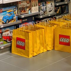 LEGO Stores Switch Plastic Bags For Paper